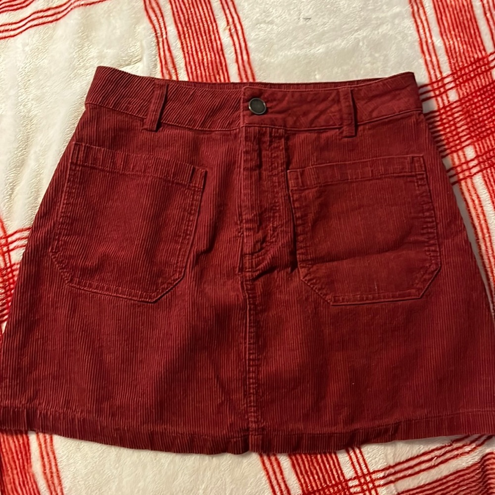Small red corduroy mini skirt